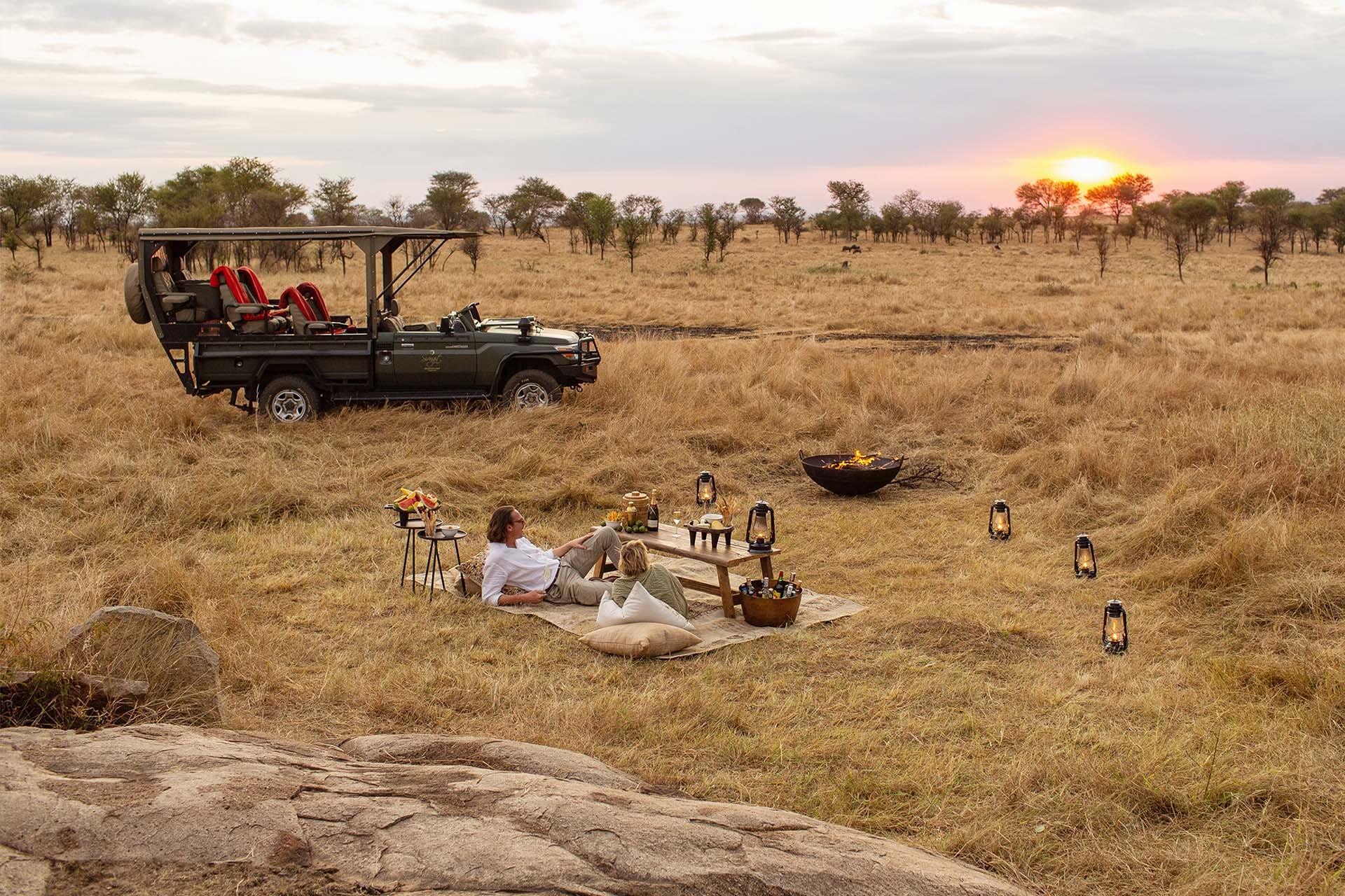 Sundowners while staying at Siringit Migration Camp